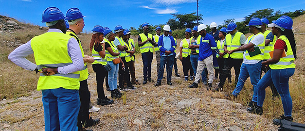 Picture of a group at a mine site. Picture of a group at a mine site.